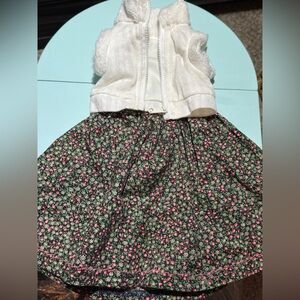 Our generation cream vest and long skirt with floral print